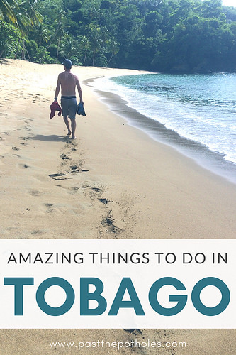 Man walking along a deserted beach with text overlay: "amazing things to do Tobago"