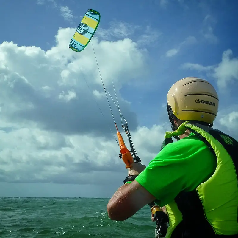 Man learning to kitesurf in Tobago.