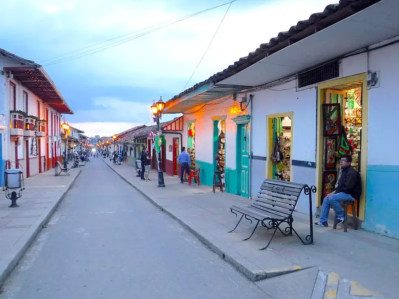 Looking down a street in quaint town of Salento at dusk.