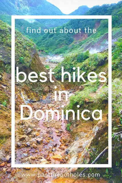 Looking through a volcanic valley with text: Find out about the best hikes in Dominica.