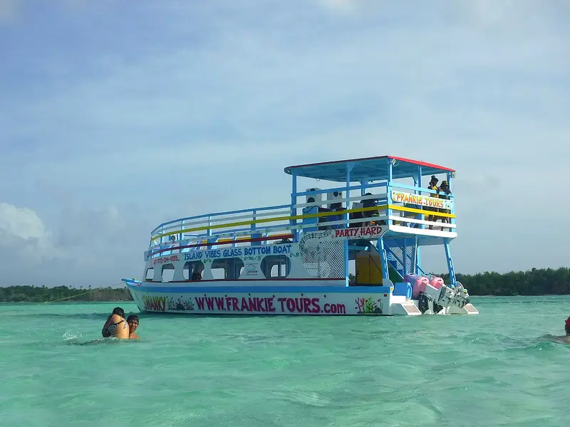 Glass bottom boat at turquoise waters of Nylon Pool in Tobago