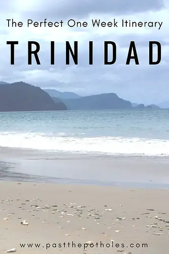 Stormy Caribbean beach with text: The Perfect One Week Itinerary for Trinidad