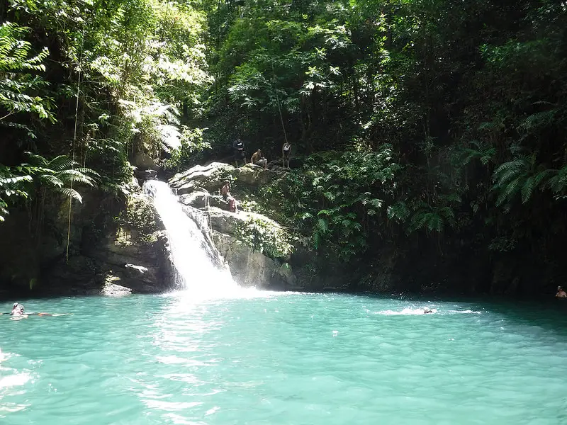 Rio Seco waterfall flowing into a blue pool - best things to do in Trinidad