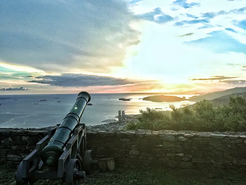 Sunset overlooking a canon and the water from Fort George, Port of Spain, Trinidad