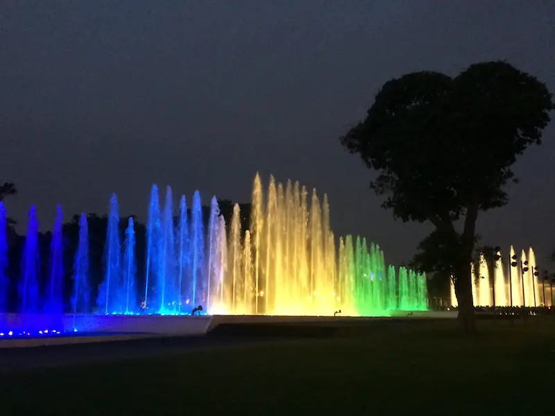 Colourfully lit water fountains at night in Lima Peru.