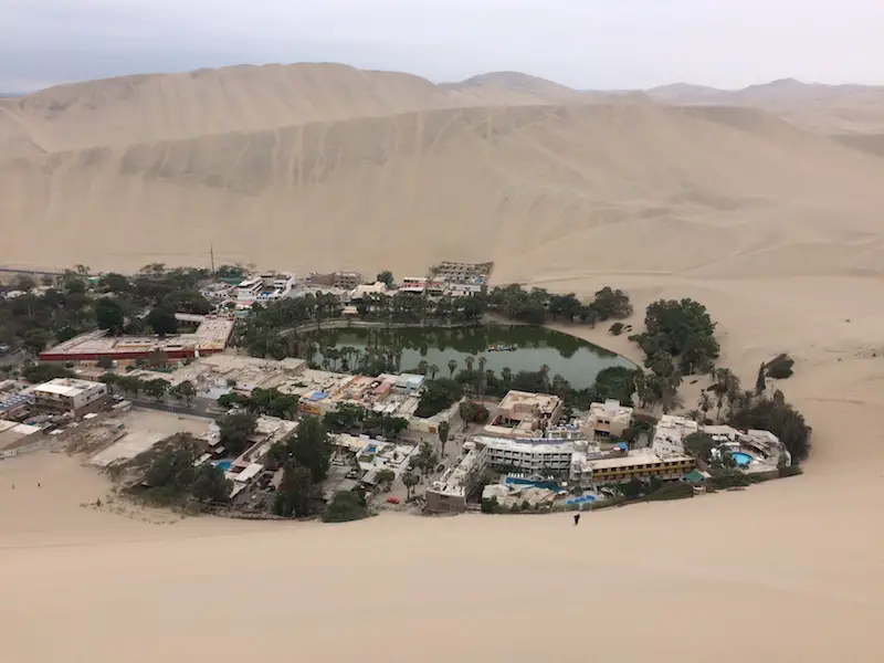 Desert oasis, Huacachina, from the sand dunes above in Peru.