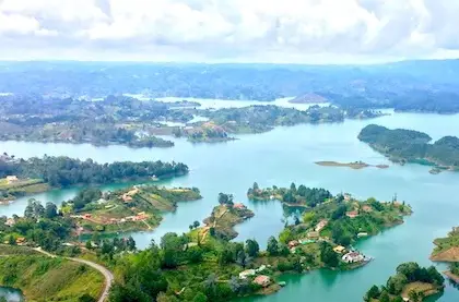view over the blue lakes and green islands of Guatape, Colombia