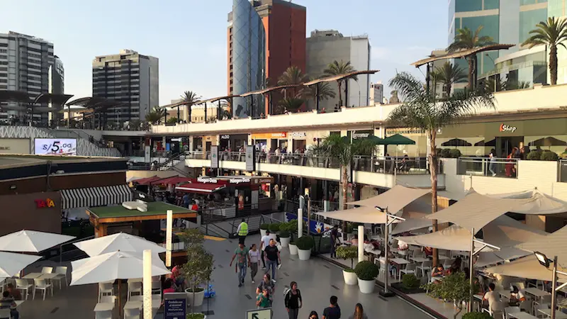 Looking down to rows of shops and people wandering at Larcomar, Lima Peru.