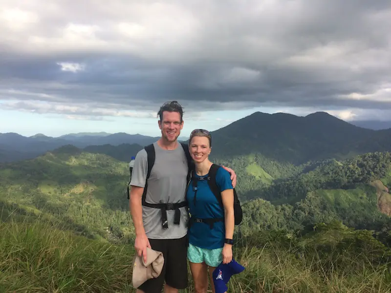 Couple covered in sweat from hiking in Sierra Nevada de Santa Marta to Lost City, Colombia.