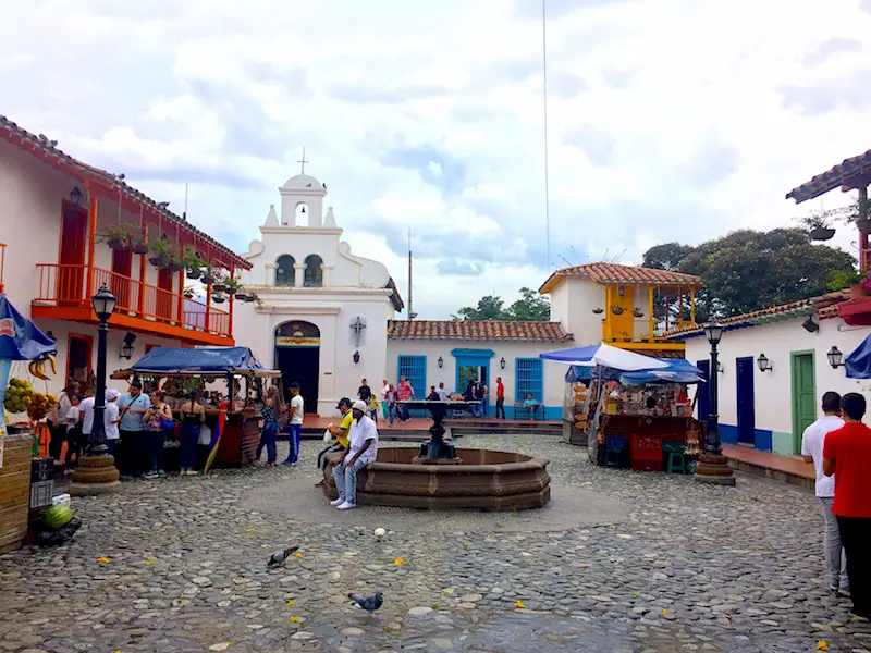 Central plaza surrounded by historic building replicas in Pueblito Paisa, Medellin.