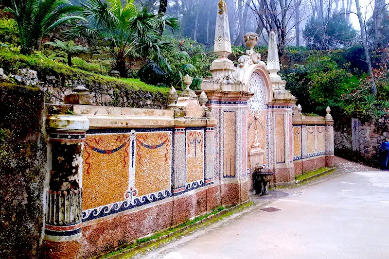 Ornate wall with fountain in a park in Sintra, Portugal.