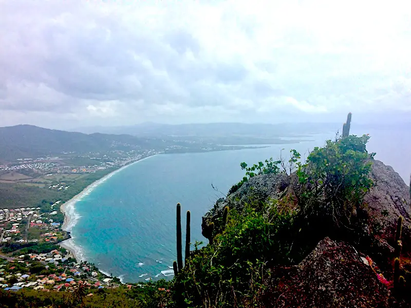 Sweeping view of bay of Le Diamant, Martinique from summit of Morne Archer volcano.