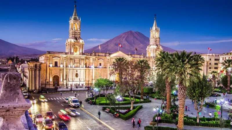 Main plaza of Arequipa in Peru lit up at sunset