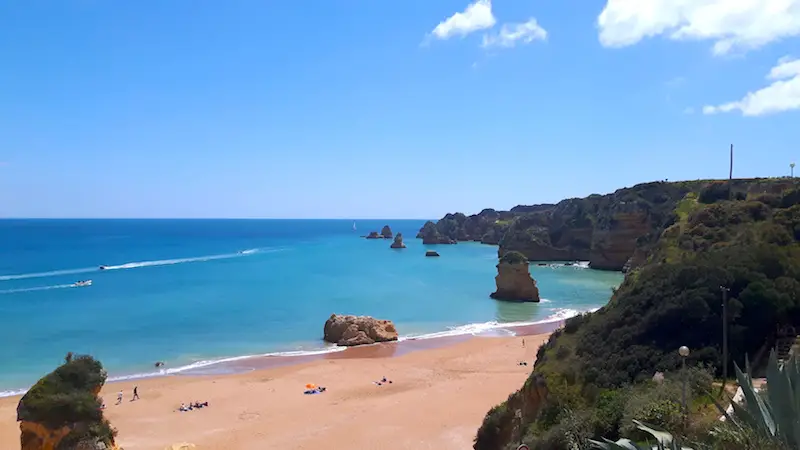 Praia Dona Ana in Lagos, Portugal on a beautiful blue day.