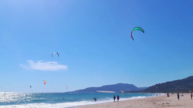 People kitesurfing in Tarifa, Spain.