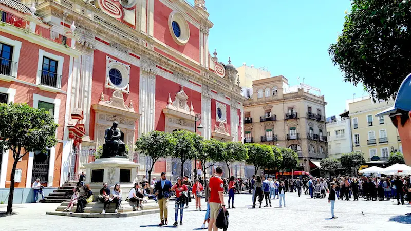 Beautifully ornate buildings in Plaza del Salvador, Seville Spain.