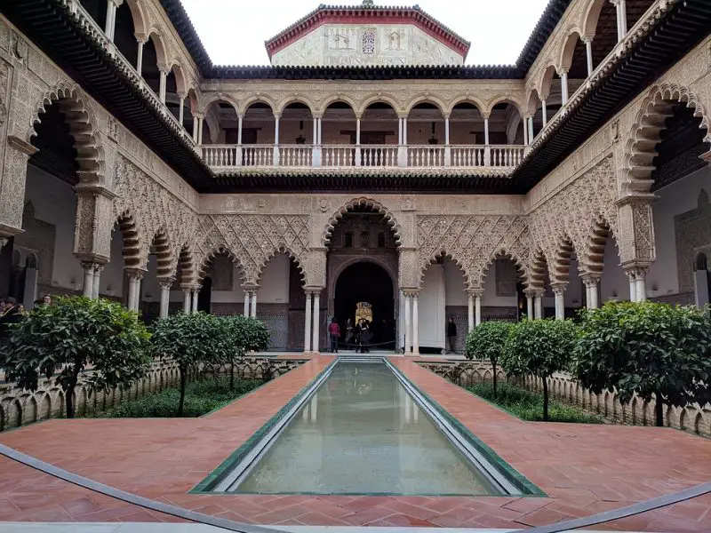 A decorative courtyard inside the Alcazar in Seville, Spain
