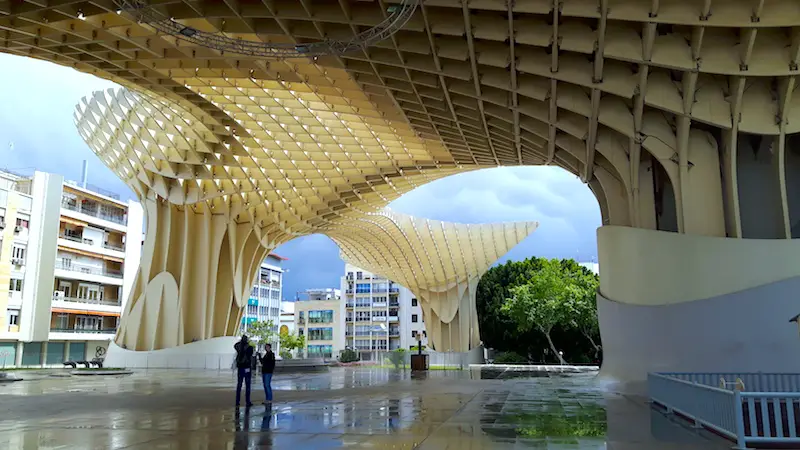 People under the structure setas de Sevilla, Spain.