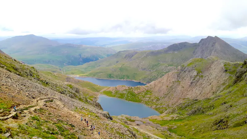 View across two lakes between mountains while climbing Mount Snowdon, Wales.