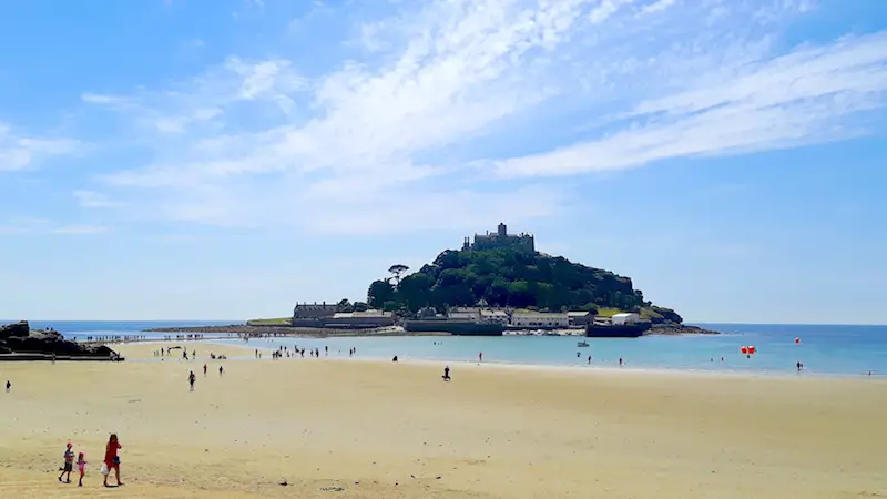 Across a golden beach to the island of St. Michael's Mount, Cornwall UK.