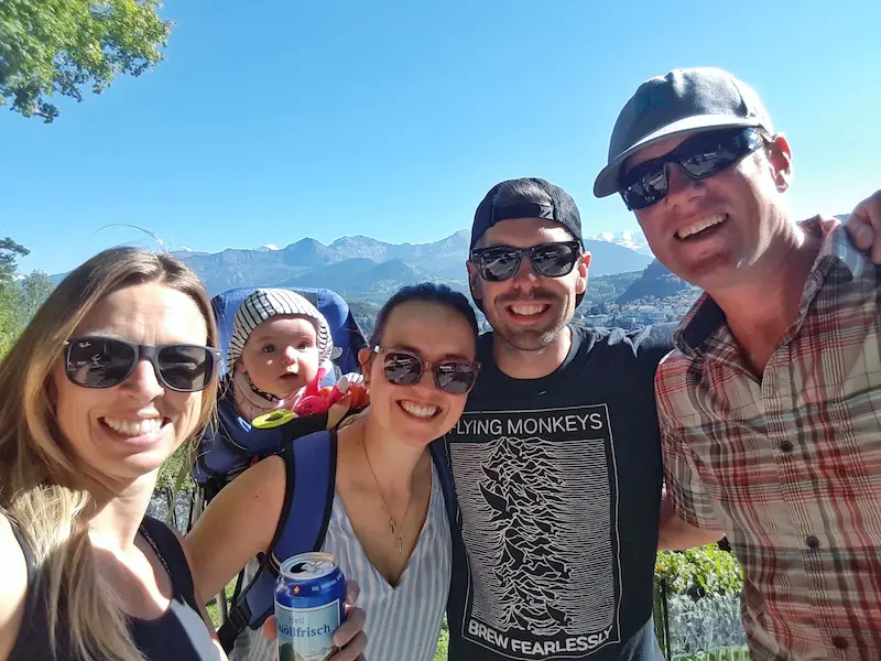 Four friends and a baby in Spietz, in the Swiss Alps, Switzerland.