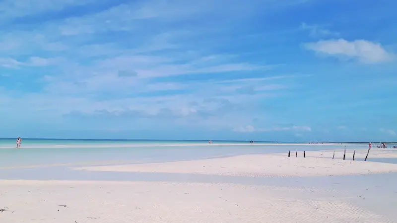 White sand bars with miles of shallow blue waters in Isla Holbox, Mexico