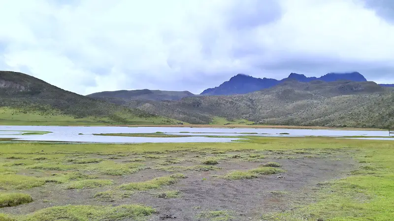 Mountain-backed Limiapungo Lake in Cotopaxi National Park, Ecuador.