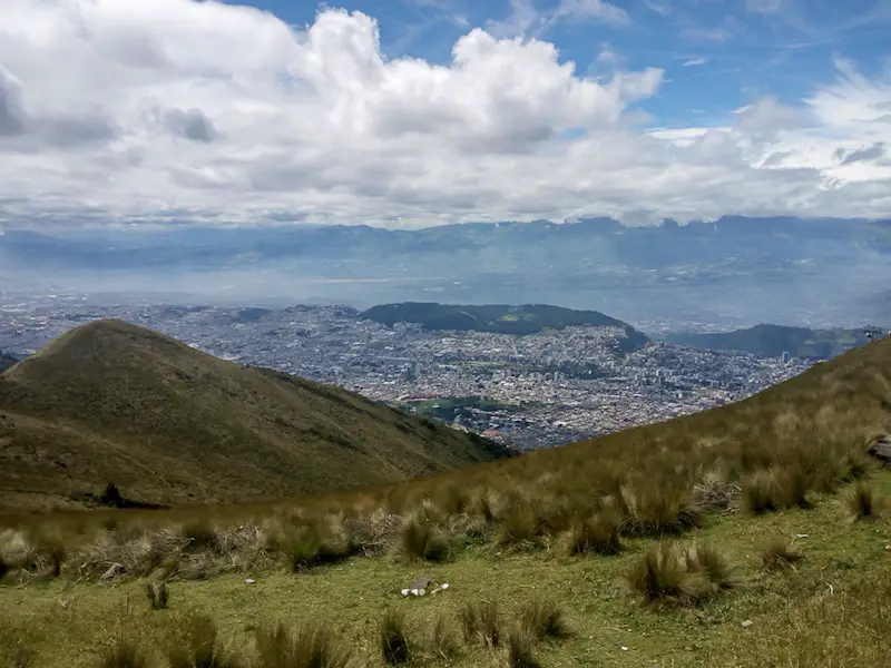 Rolling hills and mountains from the top of Pichincha Volcano in Quito Ecuador.